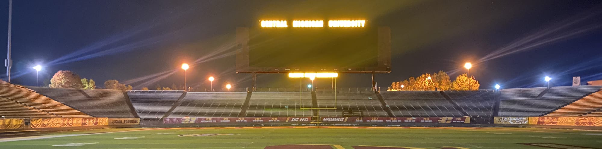 empty football stadium at night under the lights Bakersfield