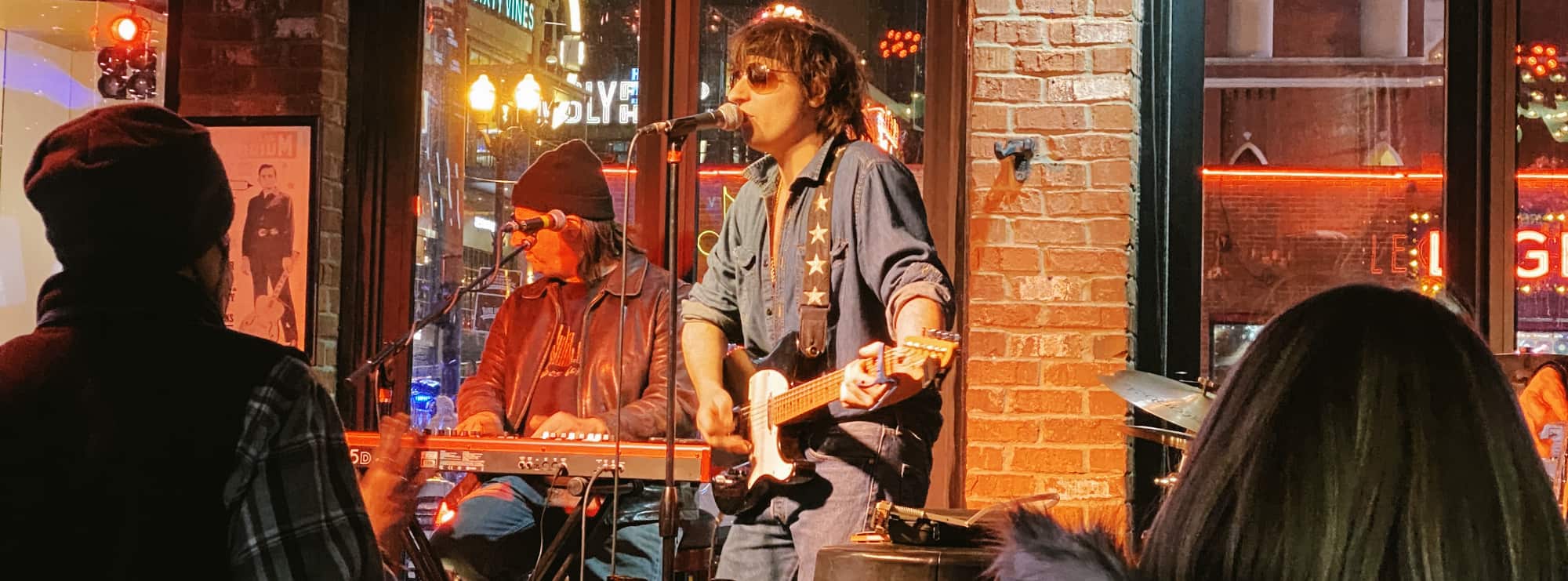bar singer on guitar in Bakersfield