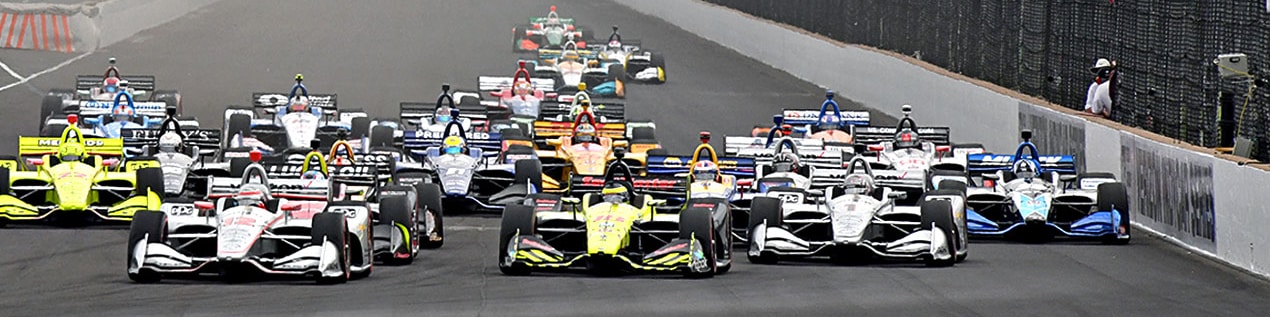 indy cars racing to through the start line Bakersfield